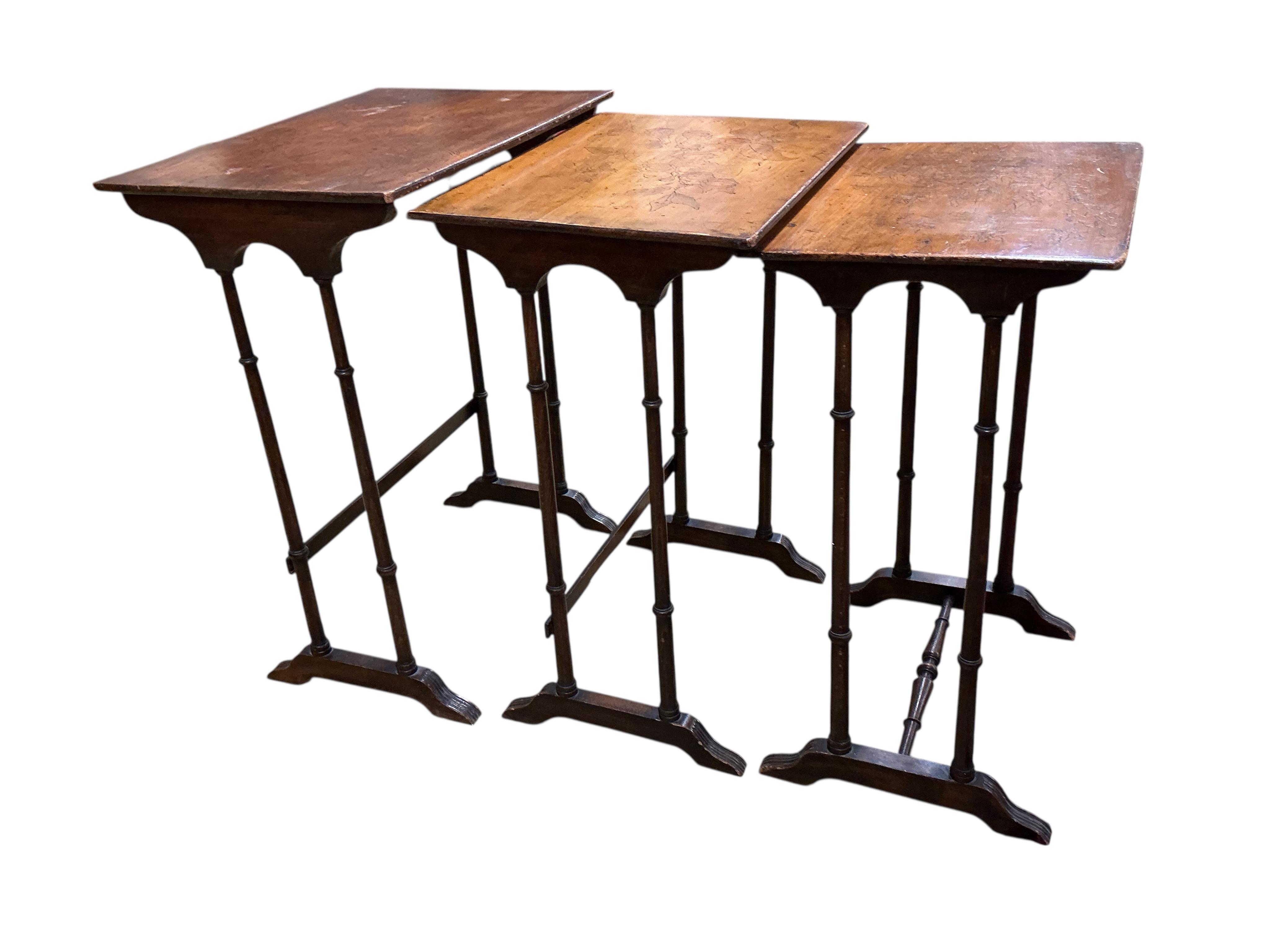 A nest of three beech occasional tables, width 56cm, depth 40cm, height 72cm